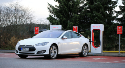 Tesla car being charged