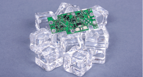 Green PCB on ice cubes