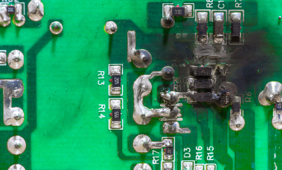 Thermal damage on a green PCB
