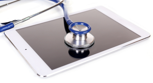  Blue stethoscope on a tablet