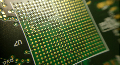 Ball grid array with vias on a green PCB