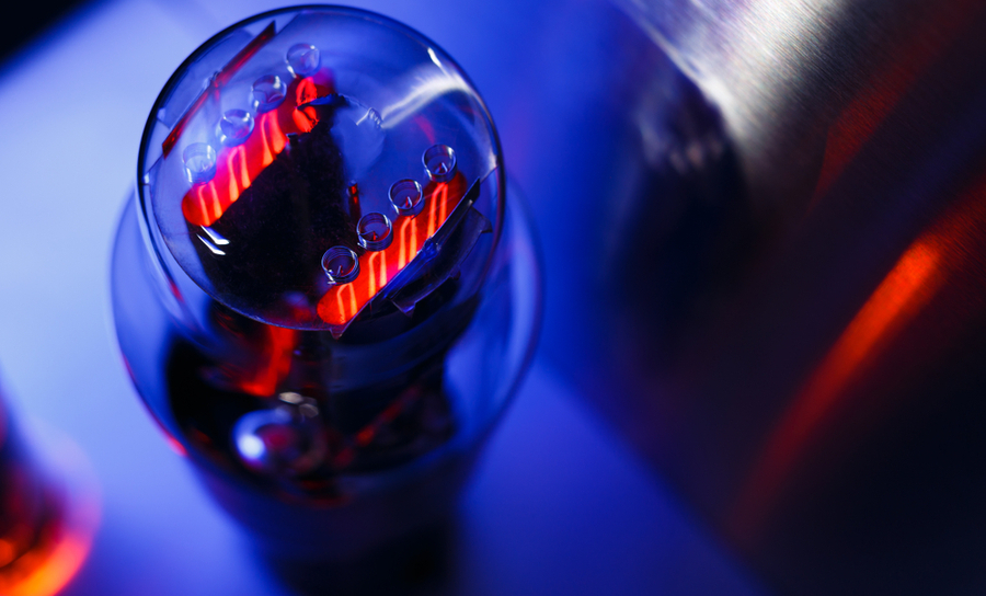 Glowing vacuum tube on a blue background