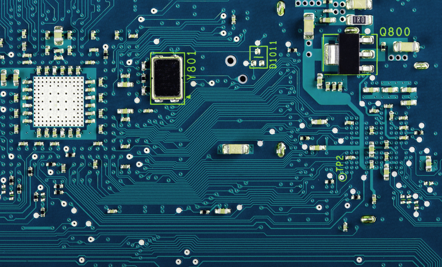 Traces and components on a blue PCB