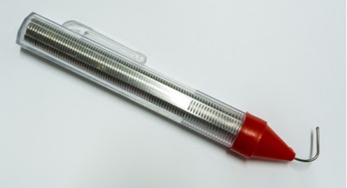 A tube of solder coil